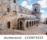 A view across the Piazzo Duomo towards the Mother Church of Saints Peter and Paul in Petralia Soprana in the Madonie Mountains, Palermo, Sicily, Italy.