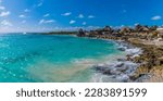 A view across the rocky shoreline at the mexican resort of Costa Maya on the Yucatan peninsula on a sunny day