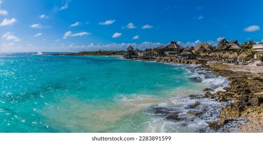 A view across the rocky shoreline at the mexican resort of Costa Maya on the Yucatan peninsula on a sunny day