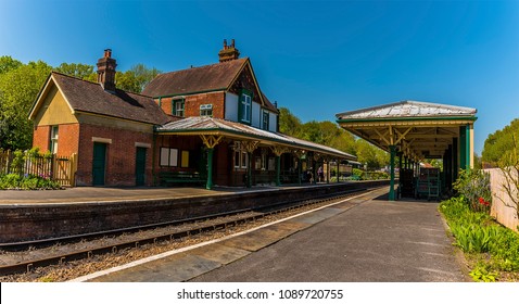 A View Across A Station On The Bluebell Railway In Sussex, UK On A Sunny Summer Day