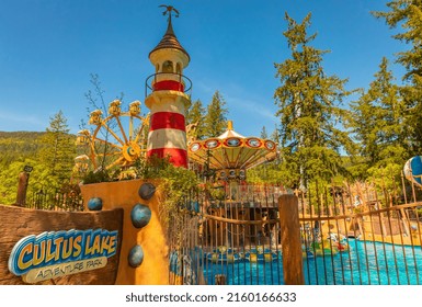 View Of Adventure Water Park, Tower And Ring And Swimming Pool. Amusement Water Park On The Cutlus Lake BC, Canada-May 22,2022-Travel Photo, Selective Focus