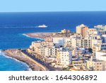 View of Aegean Sea round city of Rhodes, small ship on sea (Rhodes, Greece)