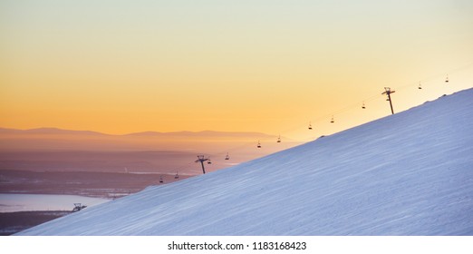 View From Afar On An Empty Chair Lift Diagonally