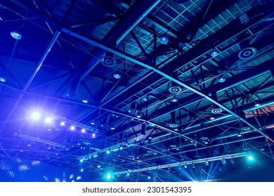 View of air conditioning system and roof lighting of large event venue.
