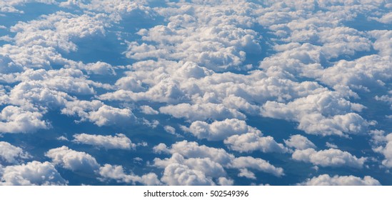 View from airplane at clouds.