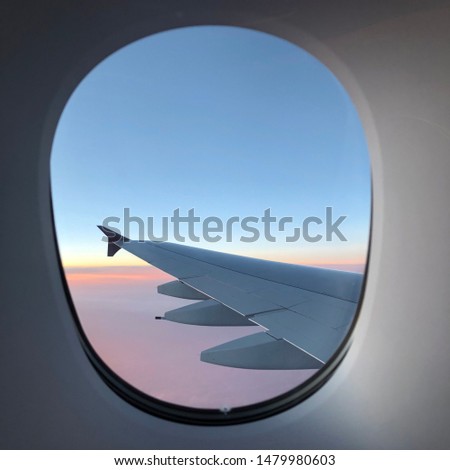 View from airplane. Flight window. Vacation destinations. Stunning cloud. 40,000 feet above sea level. Wing tip. Wing fence.