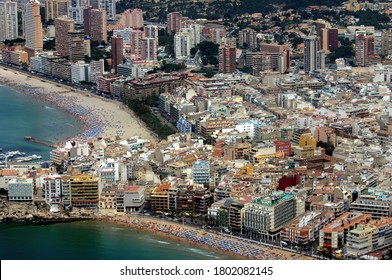 View From An Airplane Of The Magnificent And Touristic Mediterranean City Of Benidorm, A Tourist Place That Stands Out For Its Skyscrapers And Nightlife, An Example Of Mediterranean Life