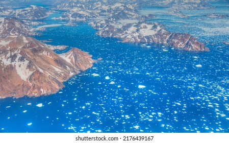 View From Airplane Of Melting Polar Ice Cap Greenland