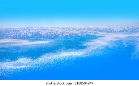 View From Airplane Of Melting Polar Ice Cap Greenland