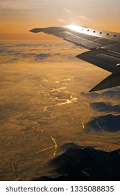 View From An Airplane Over A Winterlandscape In Central Asia