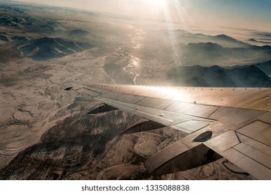 View From An Airplane Over A Winterlandscape In Central Asia