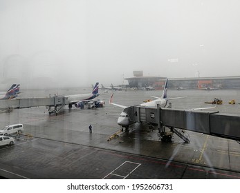 View Of The Airport Boarding Area On A Foggy Day