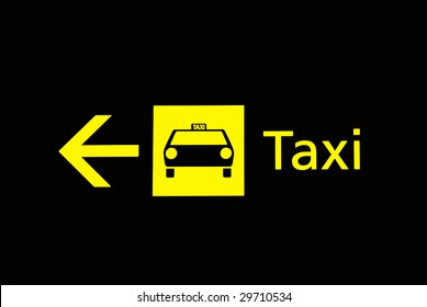 View Of Airport Taxi Sign In Black Background