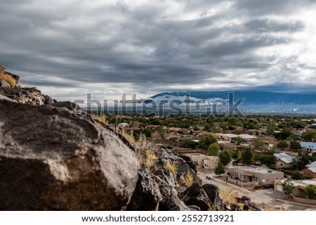 Similar – Image, Stock Photo Dramatic storm over Monument Valley road