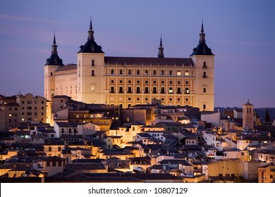 View Of The Alcazar In Toledo, Spain At Dusk.