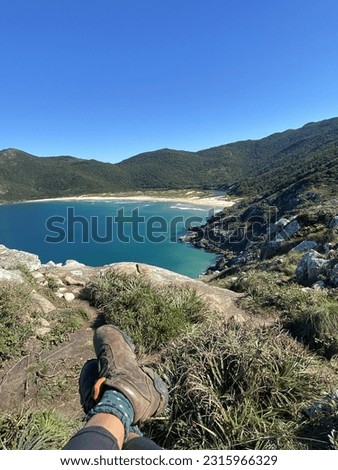 view of alfo da montana beach, with legs relaxing.