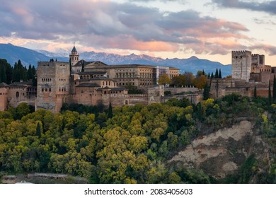View of the Alhambra Palace during the sunset from the viewpoint of San Nicolás. Granada, Spain.