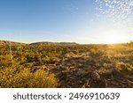 A view of Alice Springs from ANZAC Hill at sunset on a bright sunny day in the Northern Territory, Australia.