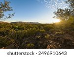 A view of Alice Springs from ANZAC Hill at sunset on a bright sunny day in the Northern Territory, Australia.