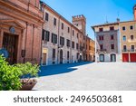 A view along the southern side of  the Matteotti Square in Imola, Italy  in summertime