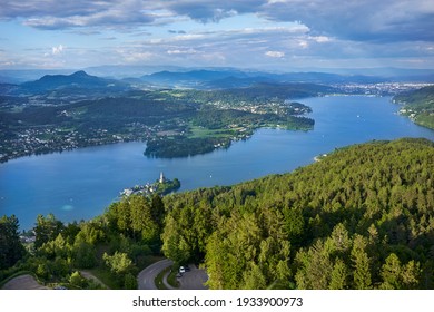     A view of alpine lake Worthersee from Pyramidenkogel, the viewing tower. Carinthia land. Austria.                           