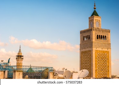 View Of The Al-Zaytuna Mosque And The Skyline Of Tunis At Dawn. The Mosque Is A Landmark Of Tunis. Tunisia, North Africa.