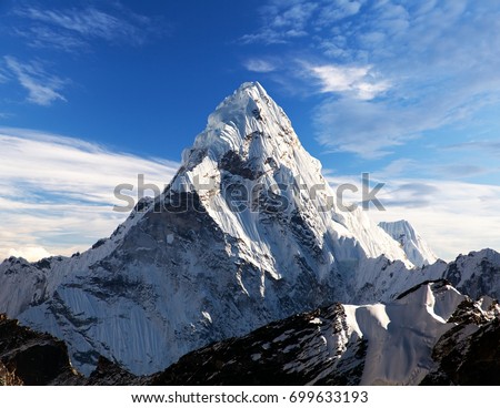 View of Ama Dablam on the way to Everest Base Camp with beautiful cloudy sky, Sagarmatha national park, Khumbu valley, Nepal