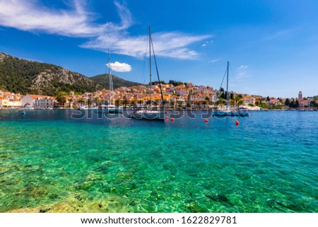 View at amazing archipelago with fishing boats in town Hvar, Croatia. Harbor of old Adriatic island town Hvar. Popular touristic destination of Croatia. Amazing Hvar city on Hvar island, Croatia.