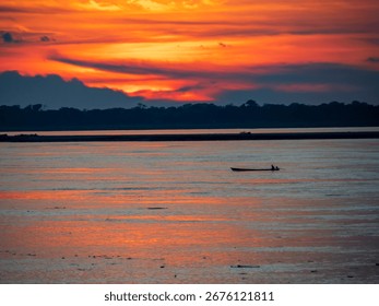 View of Amazon River during sunset Amazonia.  Peru. South America.
