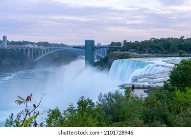 A View Of The American Falls With The Peace Bridge In The Background.