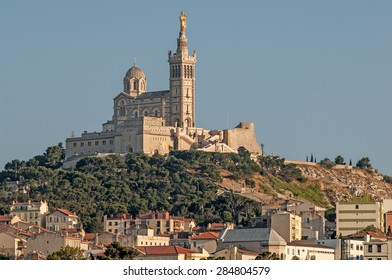 View of the ancient church Notre Dame de la Garde of Marseille in South France in the evening