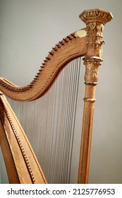 View Of Ancient Harp On Wall Background