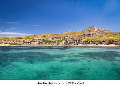 View Of Ancient Ruins On The Island Of Delos, Near Mykonos Island, Greece