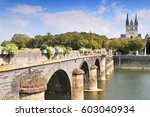 View of Angars with bridge and cathedral St Maurice France.