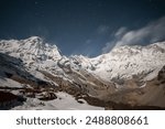 View of Annapurna I (8,091 m) and Annapurna South (7219 m) at the night time seen from Annapurna base camp, Nepal.