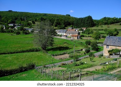 View Of Anost Le Creux, An Idyllic Village In A Valley In The Morvan, Burgundy, France, With Forest, Meadows And Kitchen Gardens
