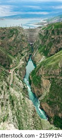 View Of The Arch Dam With A Spillway In The Canyon