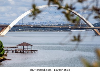 View From An Arch Of JK Bridge Over Paranoá Lake In Brasilia, Capital Of Brazil. Cityscape. Clouds In The Sky.