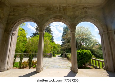 View From Arched Portico Looking Out Into The Gardens At Historic Long Island Gold Coast Mansion