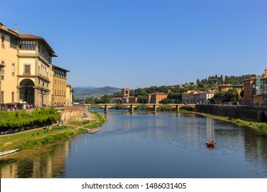 View Of The Arno River With Its Italian Houses And A Romantic Mood