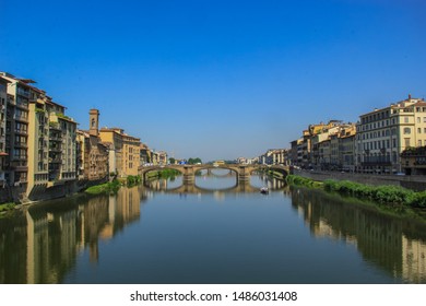 View Of The Arno River With Its Italian Houses And A Romantic Mood