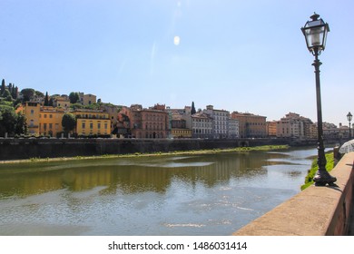 View Of The Arno River With Its Italian Houses And A Romantic Mood