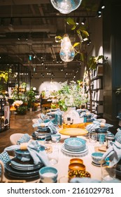 View Of Assortment Of Decor For Interior Shop In Store Of Shopping Center. Home Accessories And Household Products For Dining Room In Store Of Shopping Centre. View Of Beautifully Set Table. Home