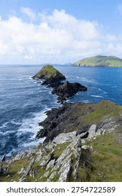 View of the Atlantic ocean from the cliffs in the ring of Kerry in Ireland on a sunny day