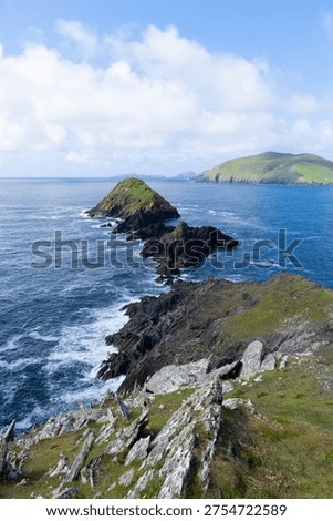 View of the Atlantic ocean from the cliffs in the ring of Kerry in Ireland on a sunny day