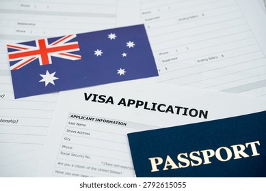 View of Australia visa application form with passport and national flag.