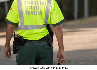 View Of The Back Of A Civil Traffic Guard In Madrid, Spain. (Civil Traffic Guard)