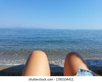 View Of Bahia Beach In Chalkidiki, Greece From The Pov Of Woman On The Shore