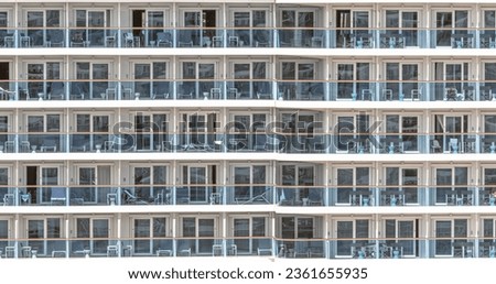 View of balcony cabins on a cruise ship.