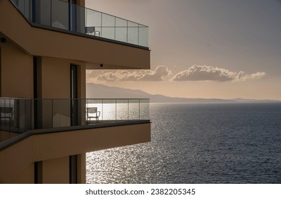 View of a balcony overlooking the sea at Saranda beach. Balcony View Of Sea And Mountains During Sunset. Holidays at sea. Villa with beautiful sea views. Beautiful modern apartment luxurious balconies - Powered by Shutterstock